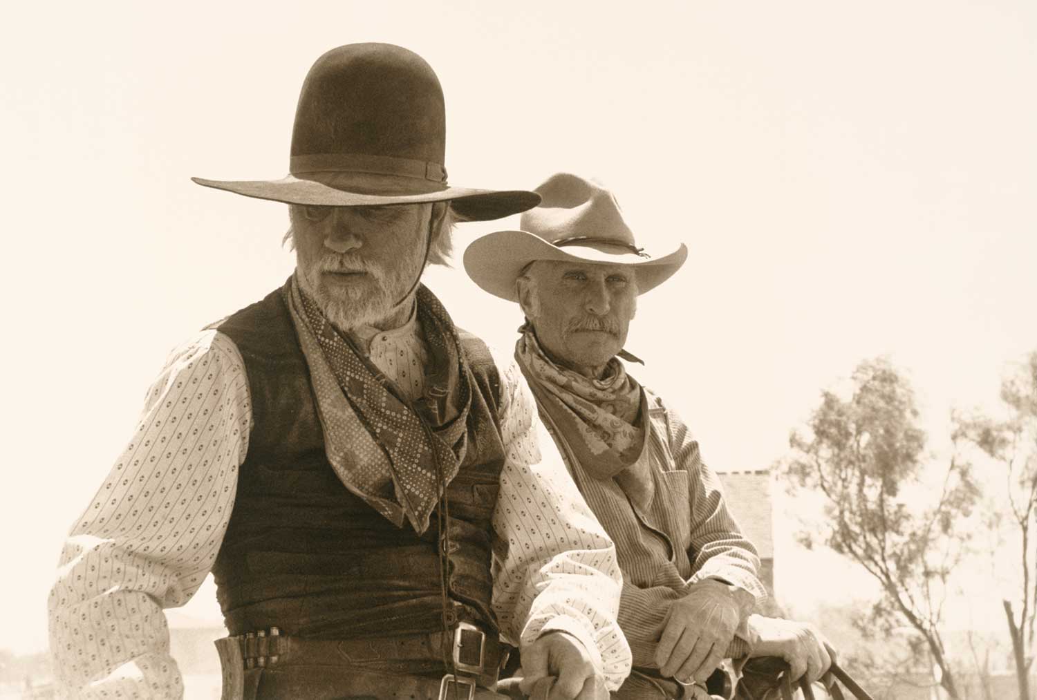 Tommy Lee Jones as Call, left, and Robert Duvall as Gus, right, on the Lonesome Dove set.